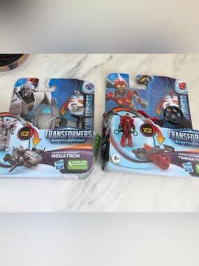 Two Transformers Earthspark Megatron and Terran Twitch1-Step Flip Changer